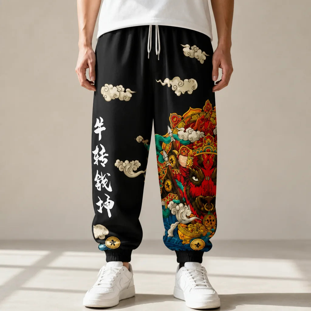 Pantalon japonais style jogging Kami porté, motif buffle doré sur fond noir