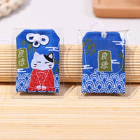Porte-bonheur japonais chat bonnes relations