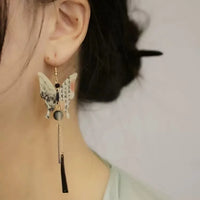 Boucles d'oreilles papillon pendantes