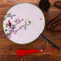 Éventail rond peinture florale