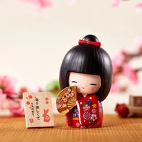 Figurine japonaise traditionnelle en kimono