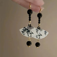 Boucles d'oreilles éventail noir à perles