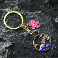 Porte-clé porte-bonheur japonais doré