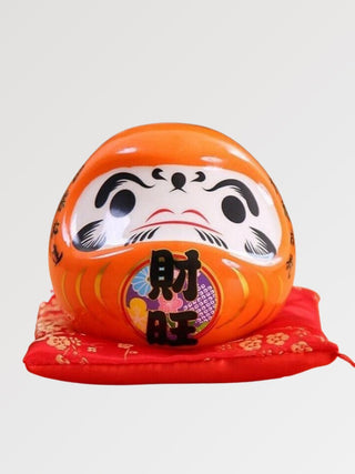 Tirelire Daruma en céramique orange
